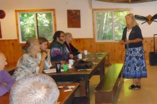 Karen McGregor speaks to small business owners at the Central Frontenac Development Committee's Business Over Breakfast event at the RKY Camp in Parham on September